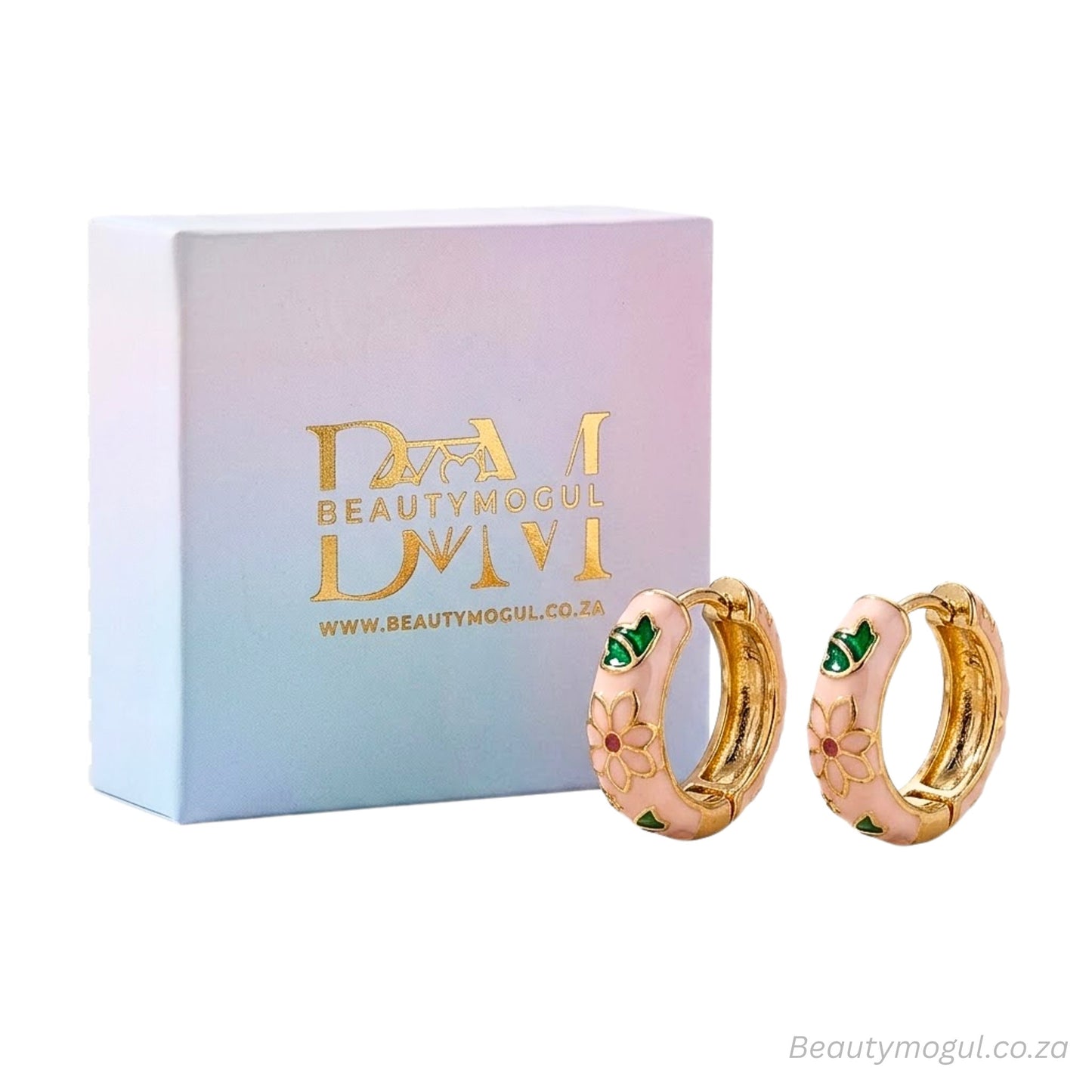 Gold hoop earrings with green accents in front of a Beautymogul box on a white background