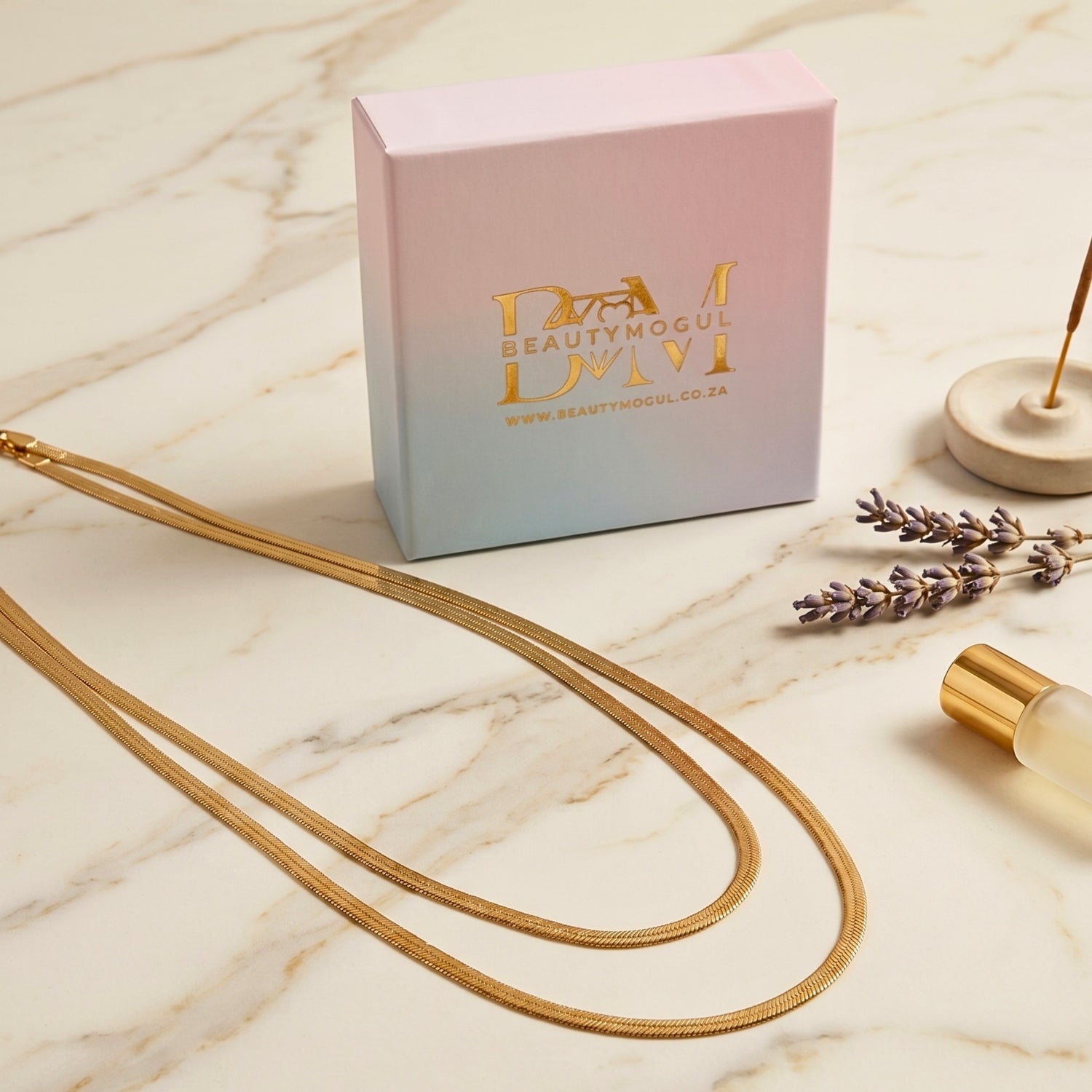beautymogul-branded-boxes-gold-snake-chain-60cm-lifestyle-white-satin