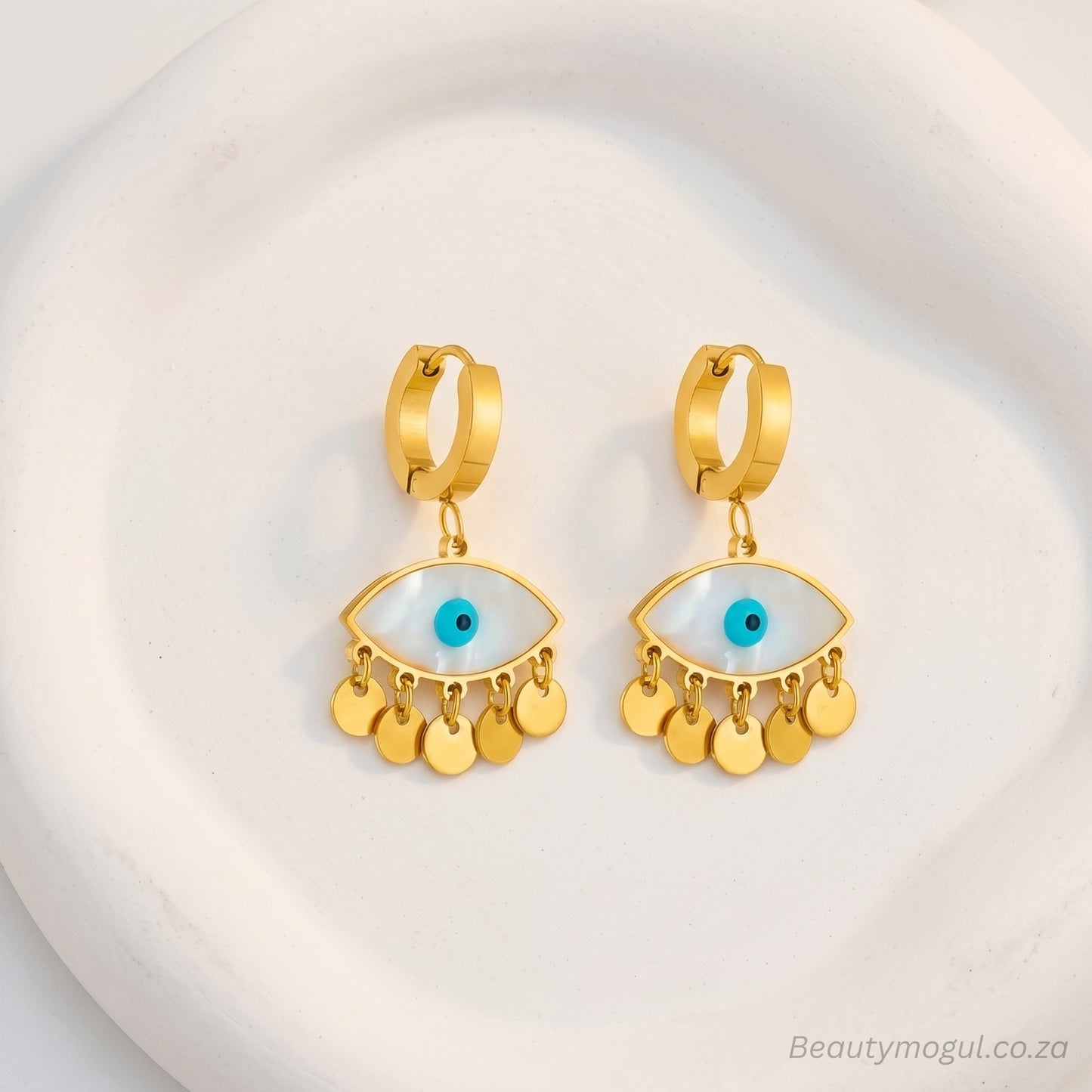 beautymogul-guardian-evil-eye-earrings-gold-flat-lay